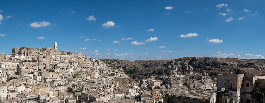 The Sassi of Matera seen from the Belvedere, with cave houses carved into the ravine at sunset