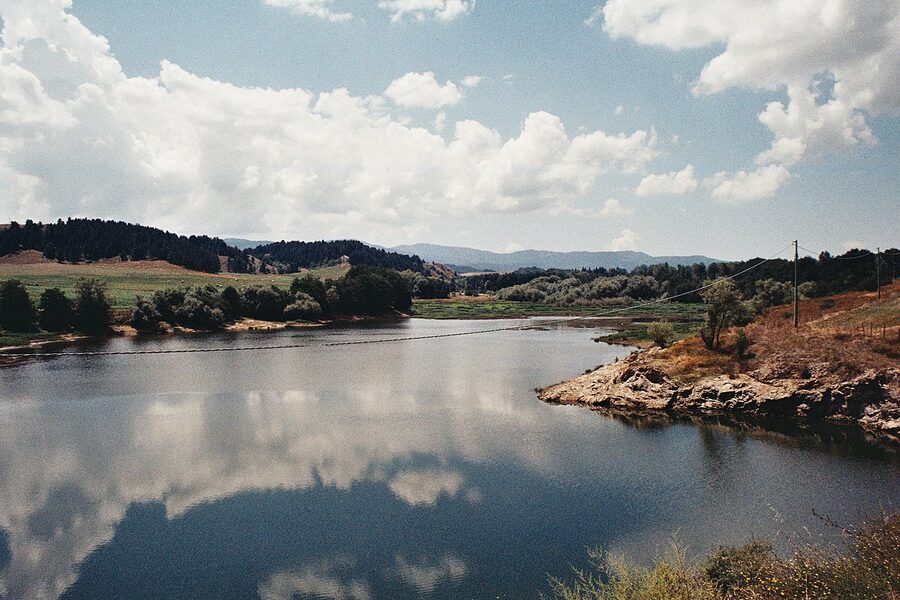 Lago Cecita in the Sila National Park, Calabria — a mountain lake surrounded by forested hills