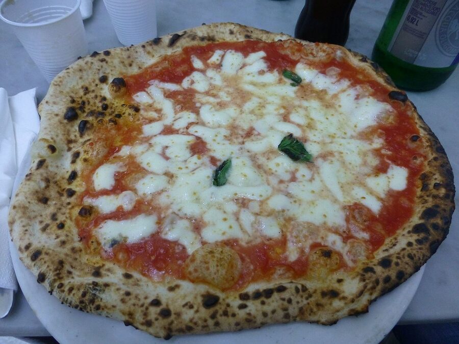 A Pizza Margherita — the canonical Neapolitan pizza
