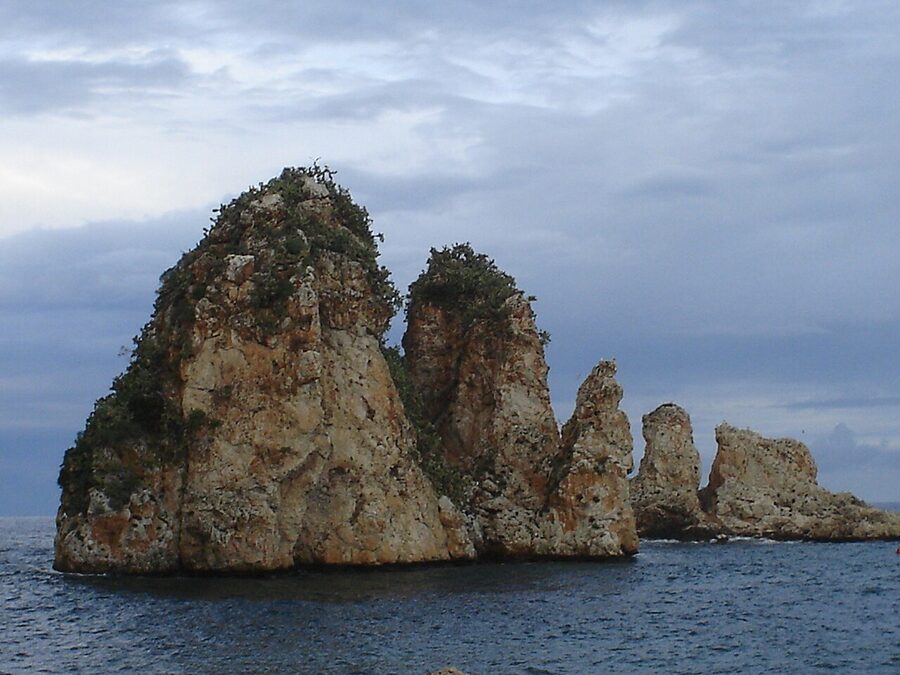 The limestone sea stacks (faraglioni) at Scopello