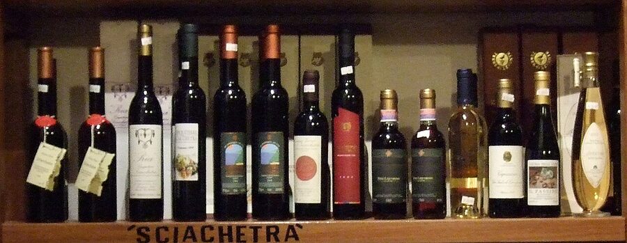 A bottle of Sciacchetrà, the sweet dessert wine of the Cinque Terre, with amber colour