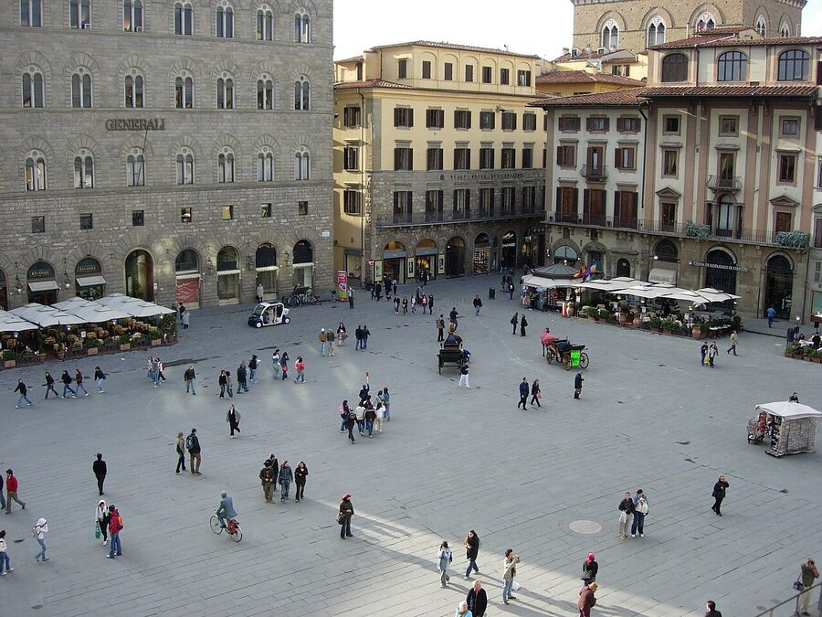 Piazza della Signoria in Florence with sculptures under the Loggia dei Lanzi and the Palazzo Vecchio tower