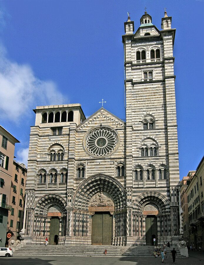 The striped black and white marble Cathedral of San Lorenzo in Genoa with Gothic-Romanesque façade