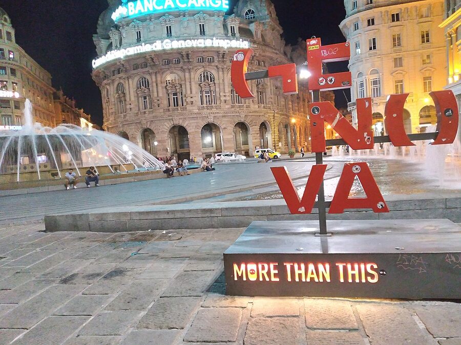Piazza De Ferrari in Genoa with the central bronze fountain and surrounding Liberty style buildings