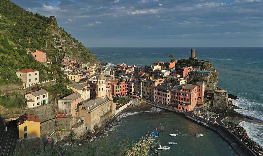 Vernazza viewed from the Sentiero Azzurro hiking trail with its small harbour and medieval tower
