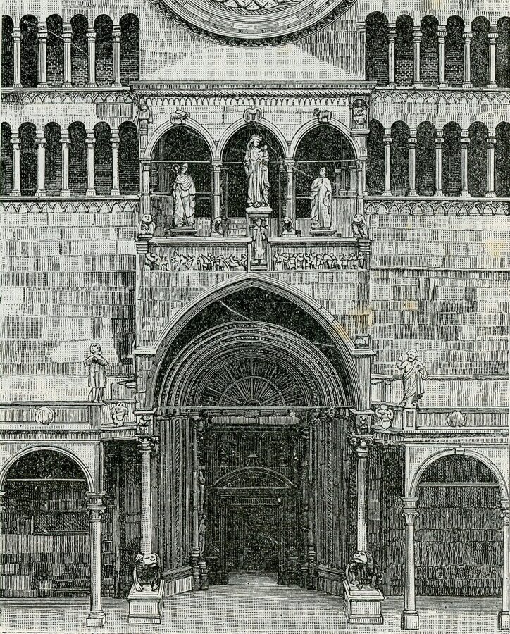 The façade of the Duomo of Cremona with Romanesque marble and the Torrazzo bell tower