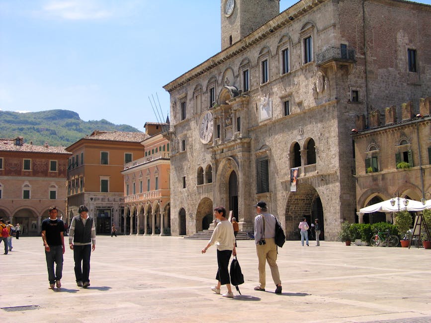 Piazza del Popolo in Ascoli Piceno with travertine Renaissance buildings and the Cafe Meletti