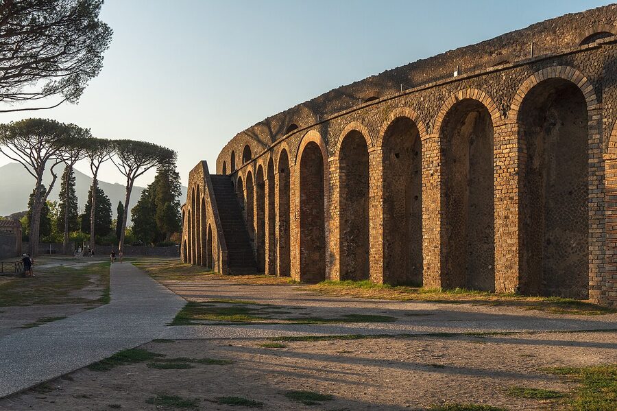 The exterior of the Amphitheatre of Pompeii at sunset