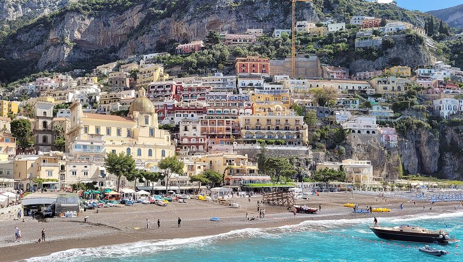 Positano village climbing the cliff above Spiaggia Grande beach
