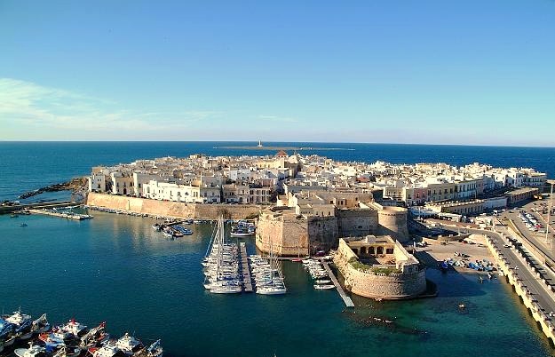The old town of Gallipoli on a small island off the Salento coast, with pastel houses and a harbour
