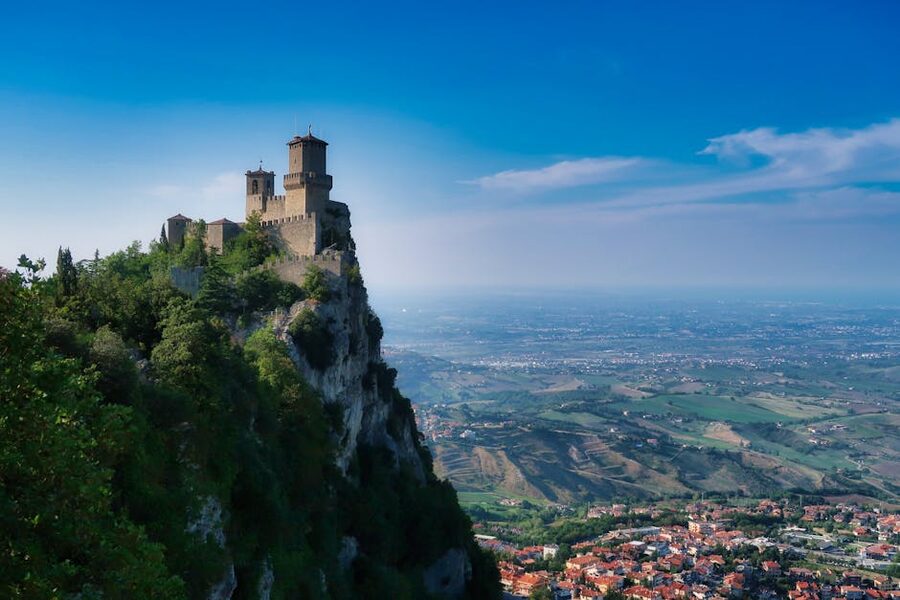 San Marino medieval fortress perched on a cliff with the valley of Emilia Romagna visible below
