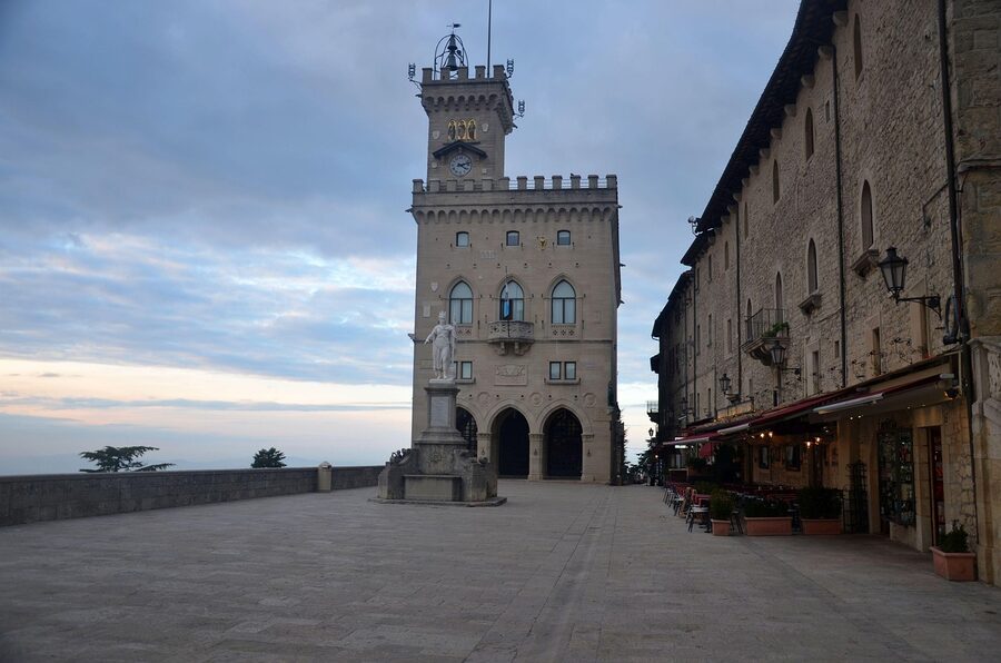 A medieval stone tower and small piazza in the historic centre of San Marino