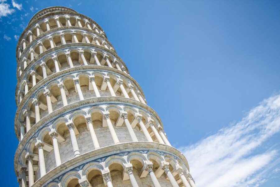 The Leaning Tower of Pisa against a clear blue sky