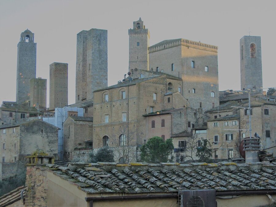 The medieval towers of San Gimignano rising above the walls of the hilltown