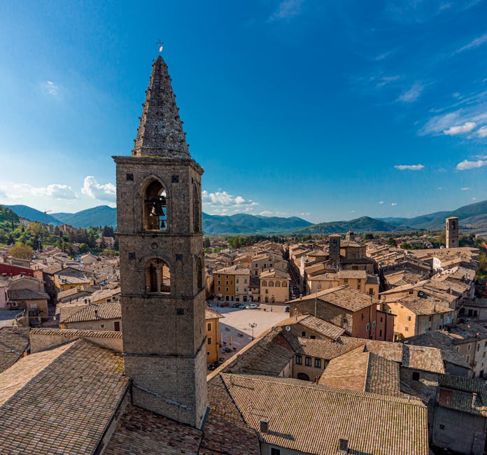 Aerial view of Urbino, Marche, showing the Palazzo Ducale and the walled medieval town on its hillside