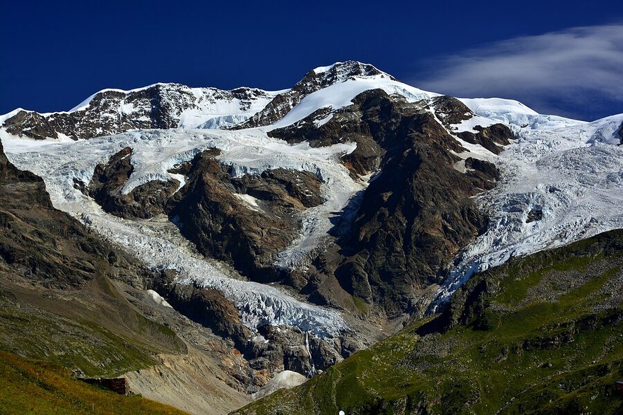 Monte Rosa seen from the Gressoney valley, snow-capped peaks and Alpine meadows